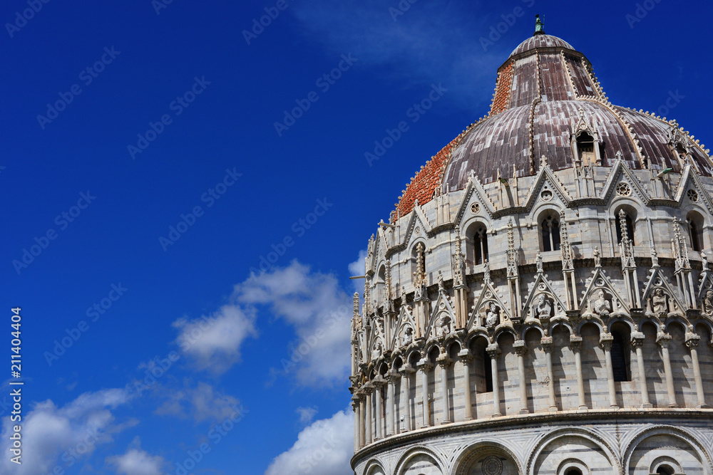 View of Pisa Baptistry medieval dome and clouds (with copy space)