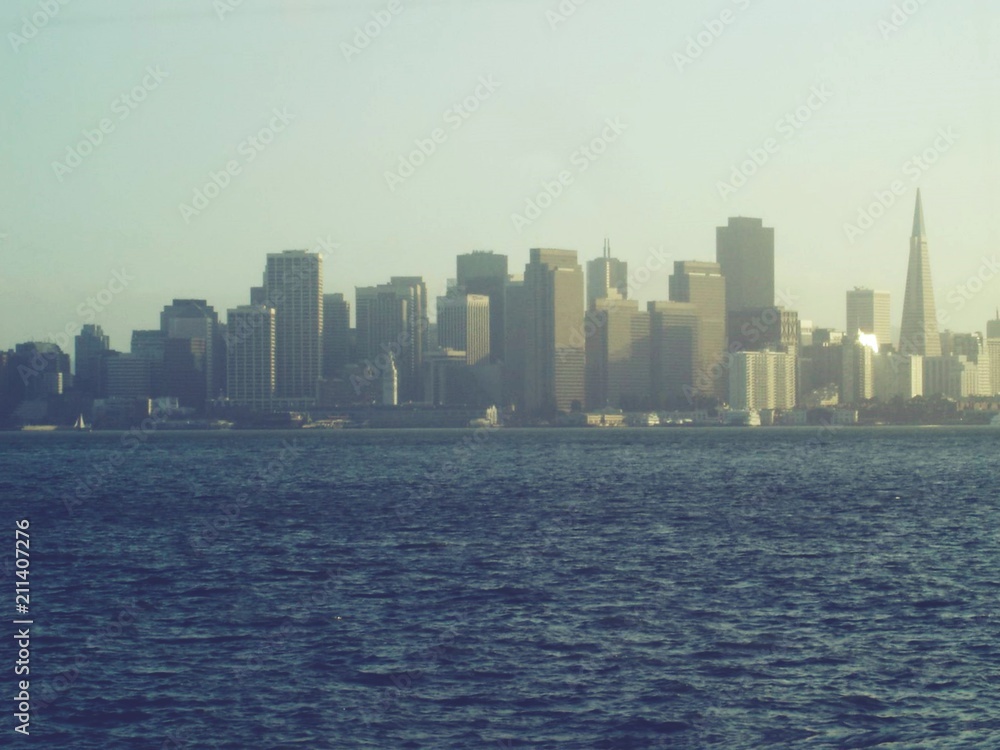 Image of foggy city close to an ocean shore Image of foggy city close to an ocean shore