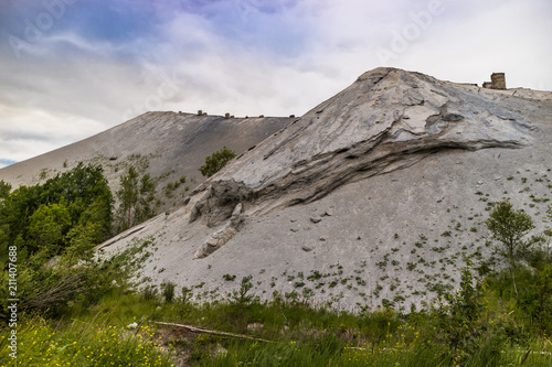 Oil shale ash heap in Estonia, dangerous toxic waste outdoors near the city.