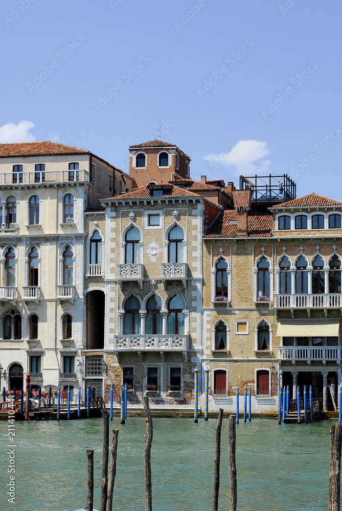 Beautiful architecture  Venice, Italy. Details of the windows and doors of the colorful houses. Street. Grand canal famous landmark panoramic view Venice Italy with blue sky white cloud.