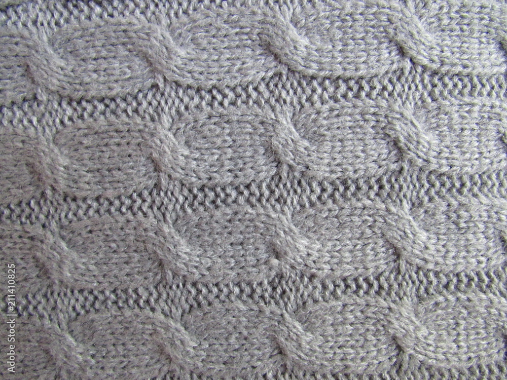 Close up of a gray knit pattern or design