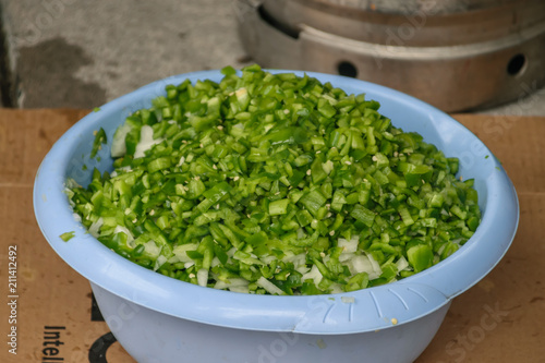  dish of freshly cut green peppers