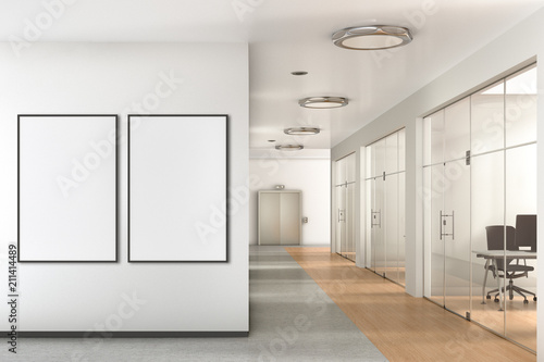 Blank poster on the wall in modern office
