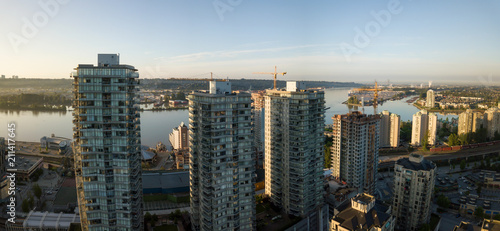 Aerial view of Residential Buildings in the city during a vibrant sunrise. Taken in New Westminster, Greater Vancouver, British Columbia, Canada.