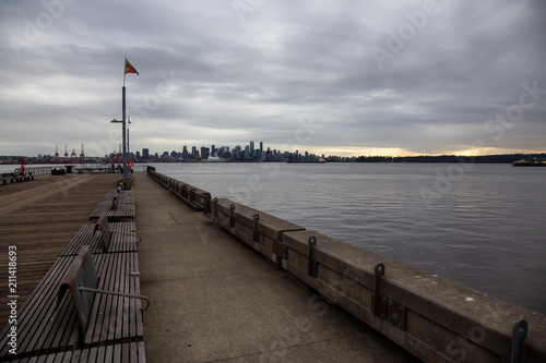 North Vancouver, British Columbia, Canada - June 5, 2018: Downtown City viewed from Lonsdale during a cloudy sunset. © edb3_16