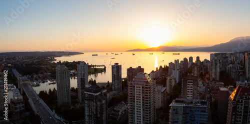 Beautiful aerial panoramic cityscape view during a vibrant sunny sunset. Taken in Downtown Vancouver  British Columbia  Canada.