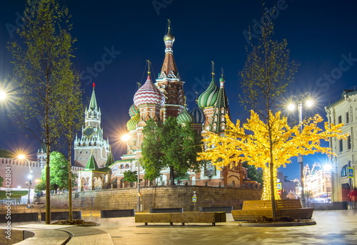 Cathedral of Vasily the Blessed (Saint Basil's Cathedral) and Spasskaya Tower on Red Square at night, Moscow, Russia photo