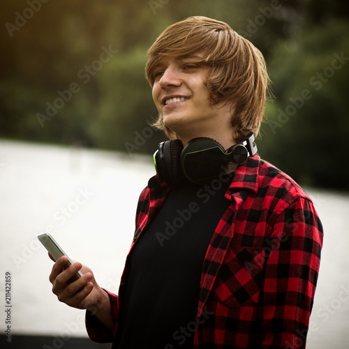 smiling teen boy with headphone