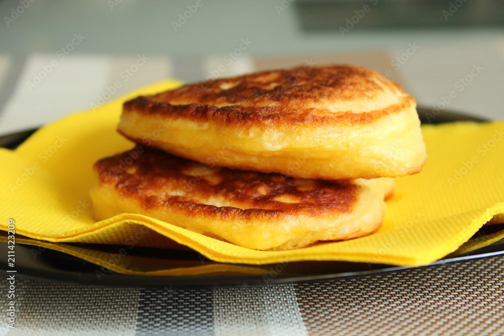 Fresh tasty muffins on a plate. Close-up. Background. Fresh tasty muffins on a plate. Close-up. Background.