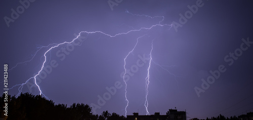 Lightning strike on the dark sky, dangerous natural electricity