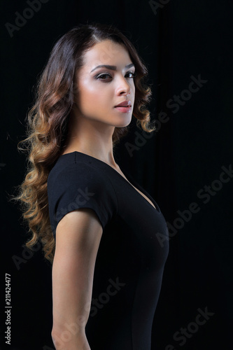 Beautiful and attractive model in black dress.