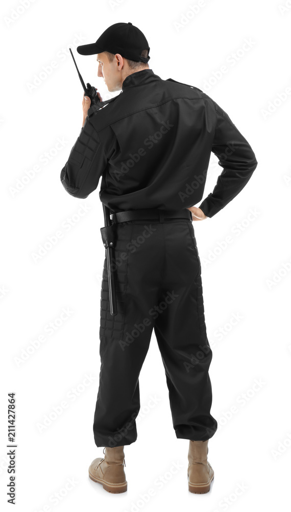 Male security guard using portable radio transmitter on white background Male security guard using portable radio transmitter on white background