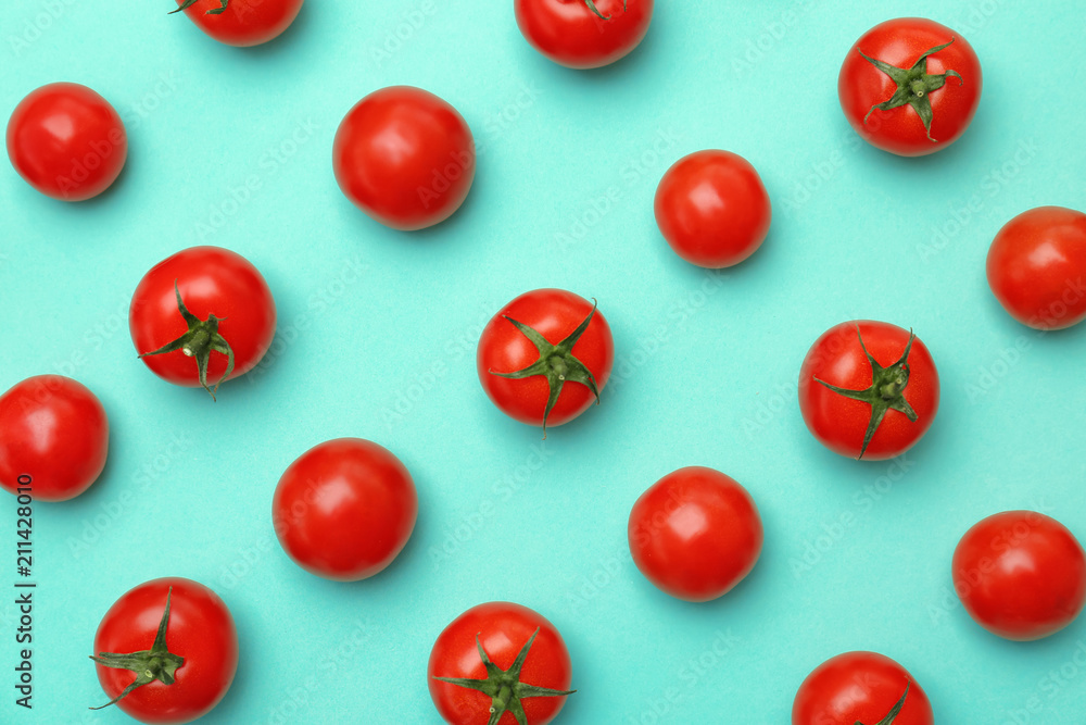 Flat lay composition with ripe tomatoes on color background Flat lay composition with ripe tomatoes on color background