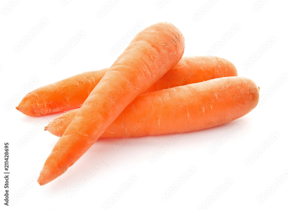 Ripe fresh carrots on white background Ripe fresh carrots on white background