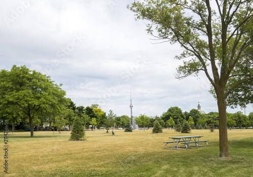 Photography Park with a picnic bench on a sunny summer day in Toronto with a view of the CN