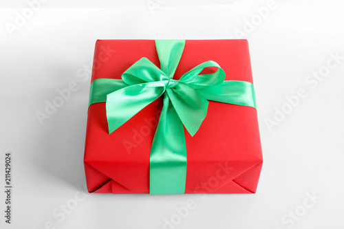 Beautifully wrapped gift box on white background