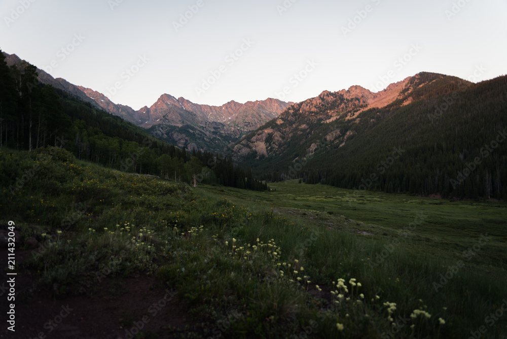 Fototapeta premium Sunset view of the Gore Range in Colorado near Piney Lake during summer. 