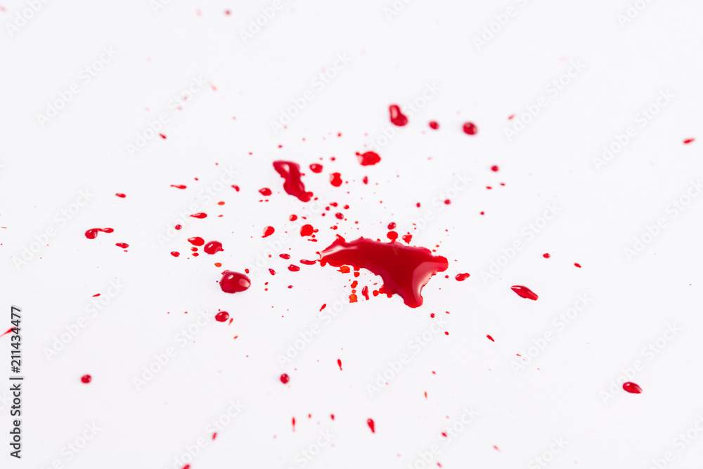 A splat of fountain pen ink on white paper A splat of fountain pen ink on white paper