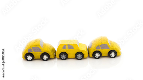 wooden car toy on white background.