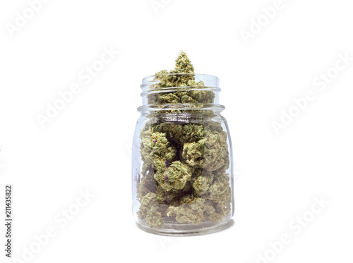 Marijuana in Jar Isolated white background photo