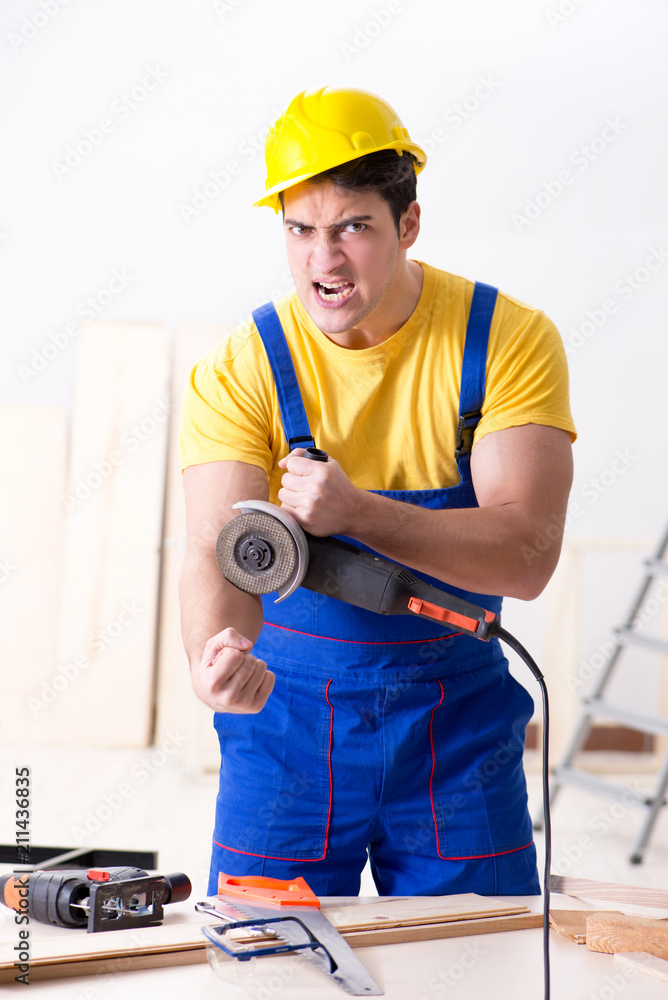 Floor repairman disappointed with his work Floor repairman disappointed with his work