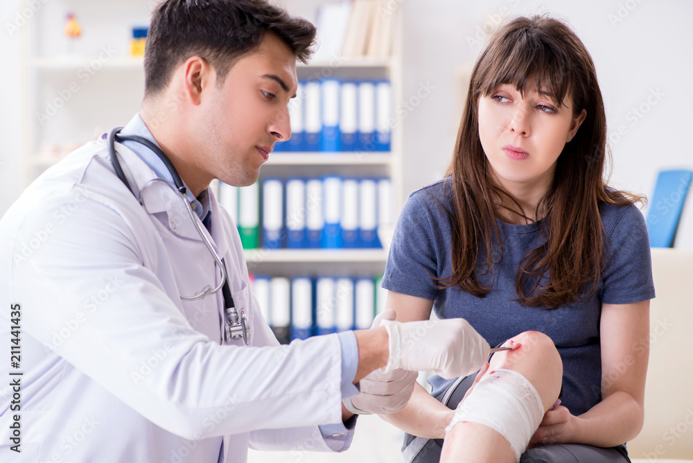 Patient visiting doctor after sustaining sports injury Patient visiting doctor after sustaining sports injury