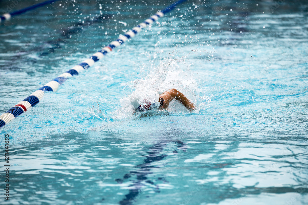 Teen female swimmer at a swim meet

