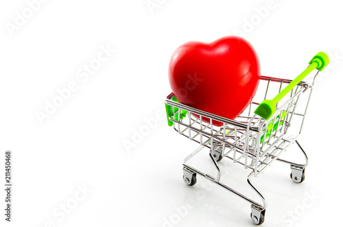 Valentine's Day concept: a red heart on the cart