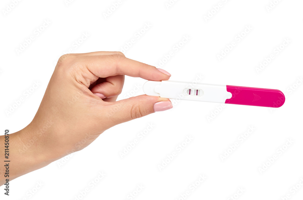 Positive pregnancy test with hand isolated on white background, two lines. Positive pregnancy test with hand isolated on white background, two lines.