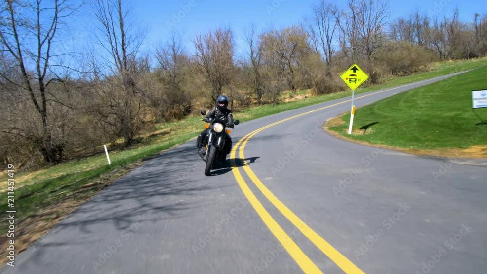 BMW Motorcycle Passing on Country Road BMW Motorcycle Passing on Country Road