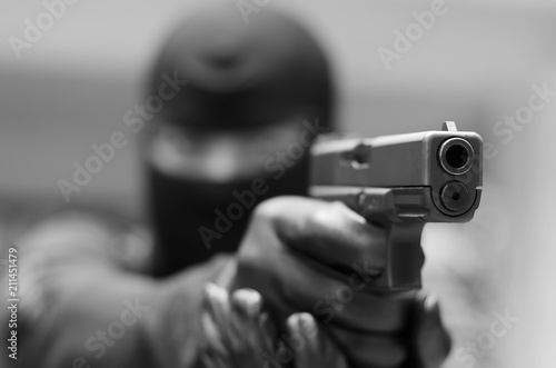 Close up men's commando who is holding guns © khampiranon