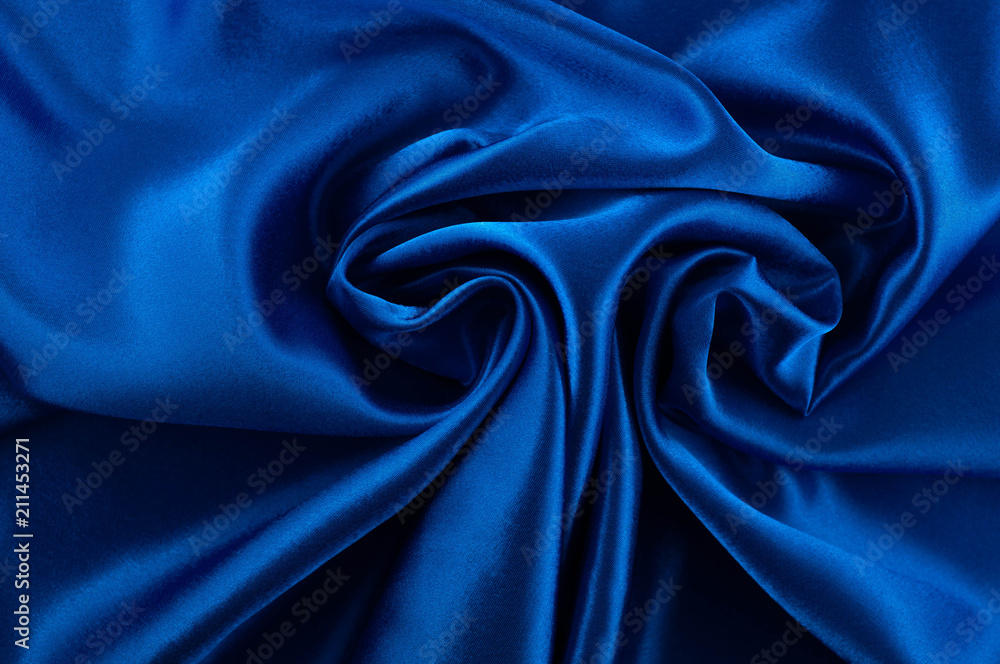 Fototapeta premium Abstract silk luxury background, piece of cloth, deep blue cloth texture