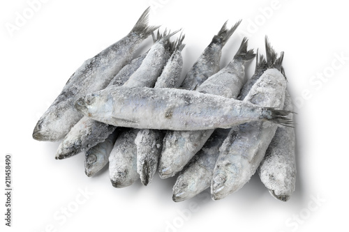  Heap of fresh raw frozen sardines