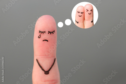 Finger art of lonely woman is crying. Concept of single girl remembers past relationship.