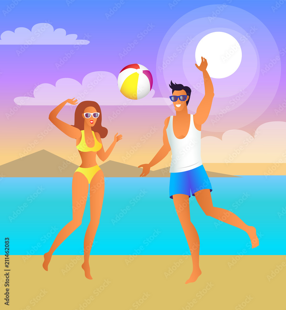 Man and Woman Play Volleyball at Tropical Beach Man and Woman Play Volleyball at Tropical Beach