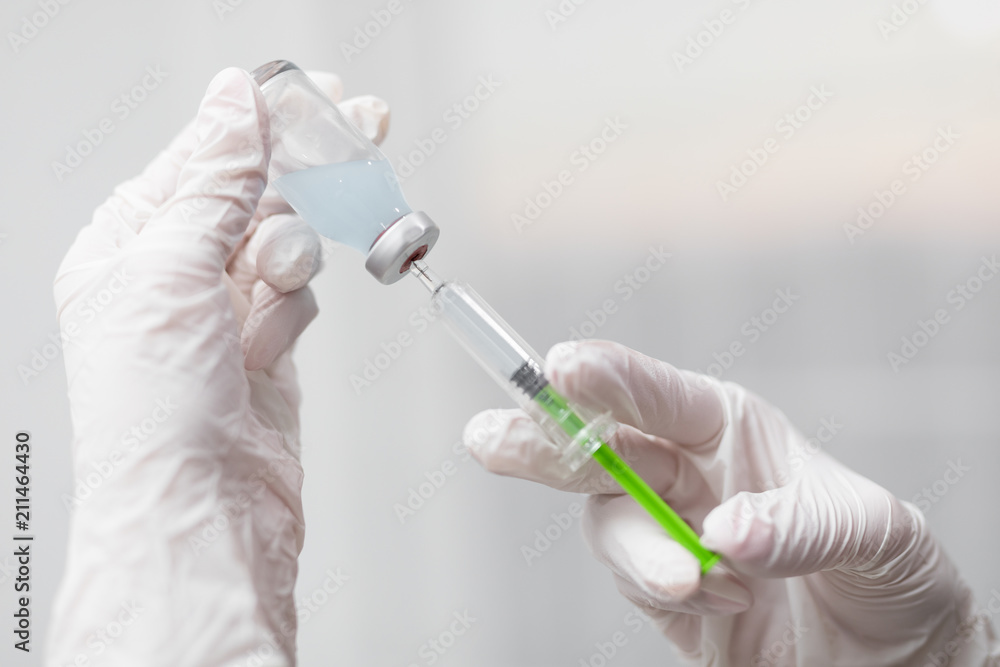 Syringe, medical injection in hand. Vaccination equipment. Syringe, medical injection in hand. Vaccination equipment.