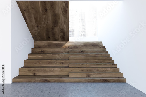 Dark wooden stairs in a white wall hall  picture