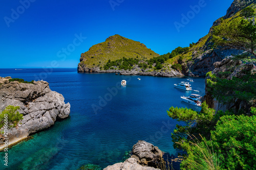 A rugged coast on a sunny summer day without clouds in Majorca, Spain 2018
