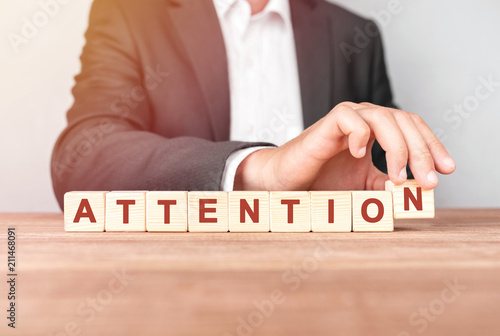 Canvas Print Man made word ATTENTION with wood blocks