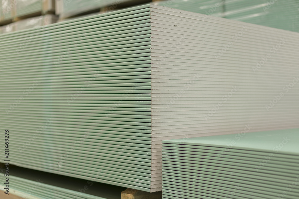 Pallet with plasterboard in the building store. Warehouse with