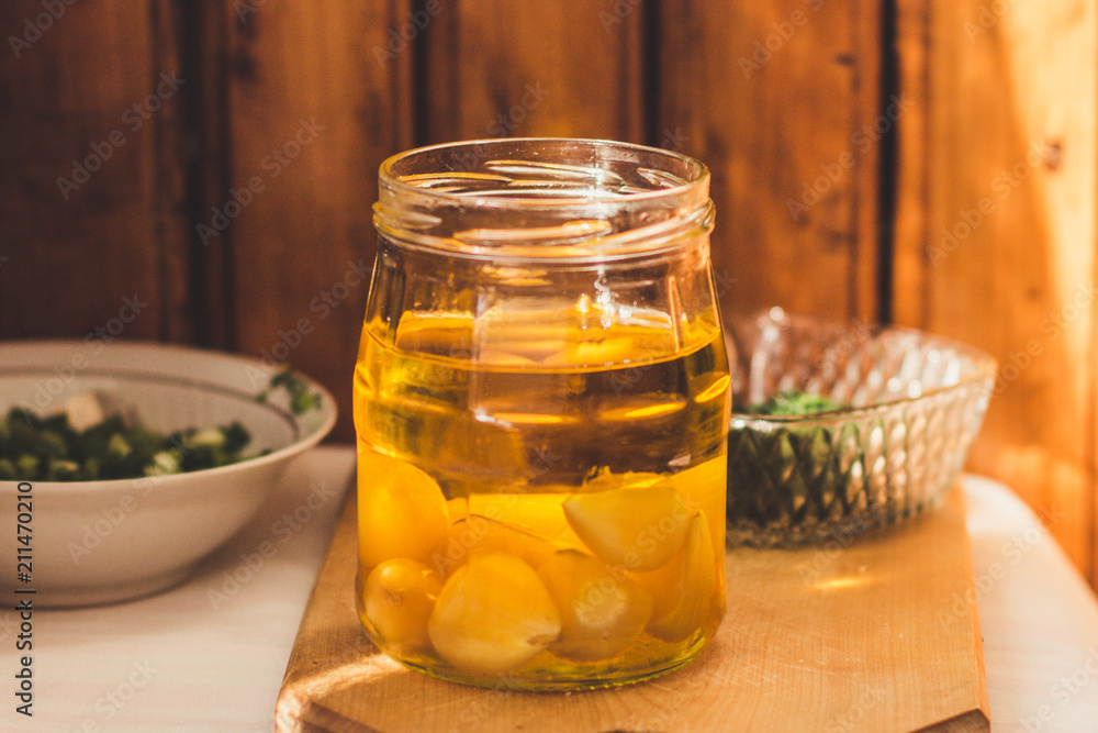 garlick vegetable oil - oil with garlic. food background garlick vegetable oil - oil with garlic. food background