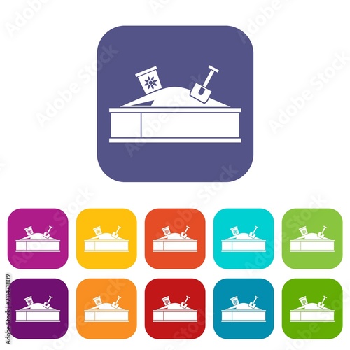 Sandbox with bucket and shovel icons set vector illustration in flat style in colors red, blue, green, and other