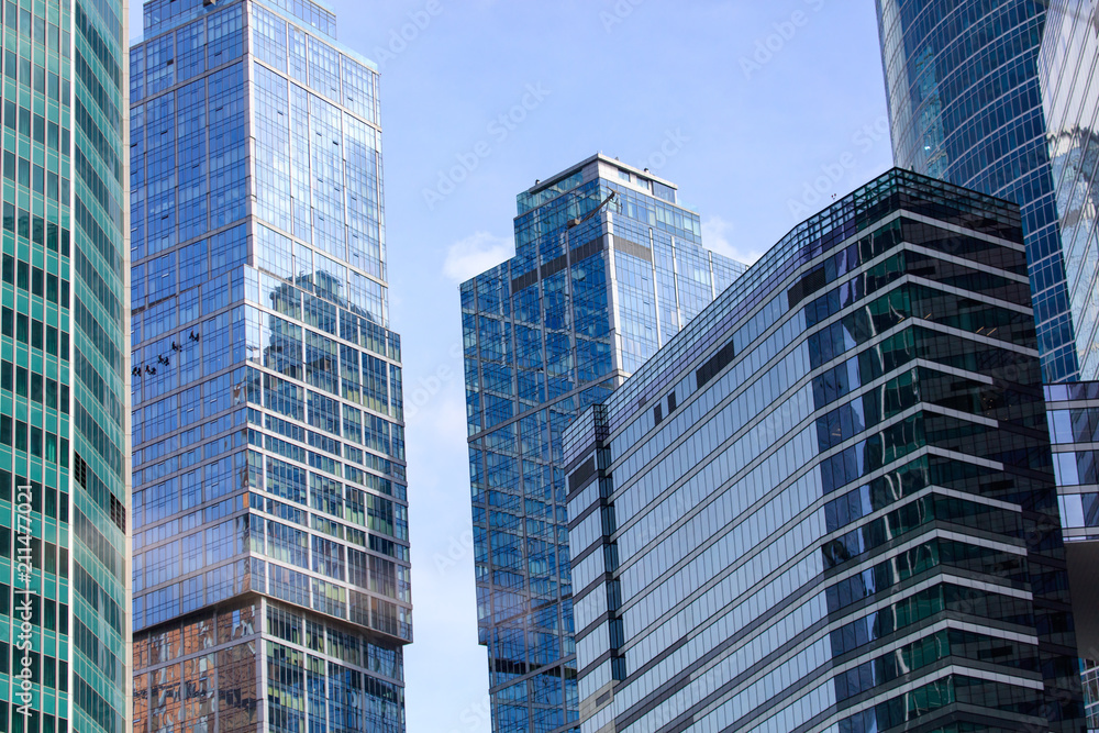 Windows on a multi-storey building as a background Windows on a multi-storey building as a background