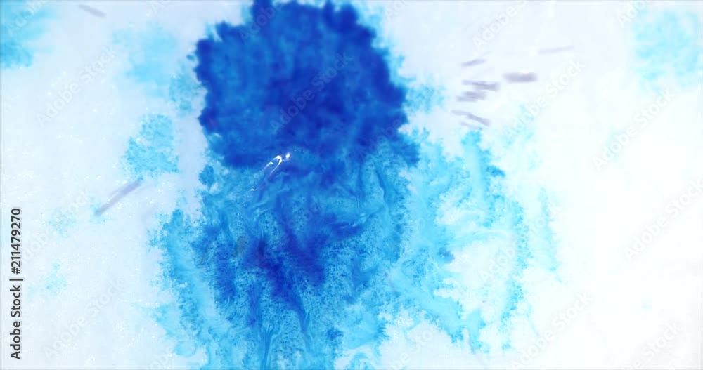Slow motion ink reveal on white paper with ink bleeds Slow motion ink reveal on white paper with ink bleeds