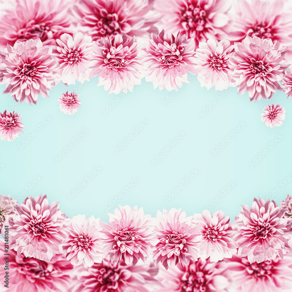 Pastel pink flowers on light blue. Floral frame . Creative layout