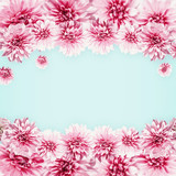 Pastel pink flowers on light blue. Floral frame . Creative layout