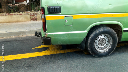 Green Van with damage photo