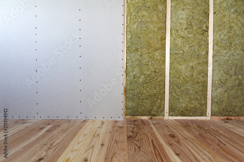 Photos Wooden frame for future walls with drywall plates insulated with rock wool and fiberglass insulation staff for cold barrier
