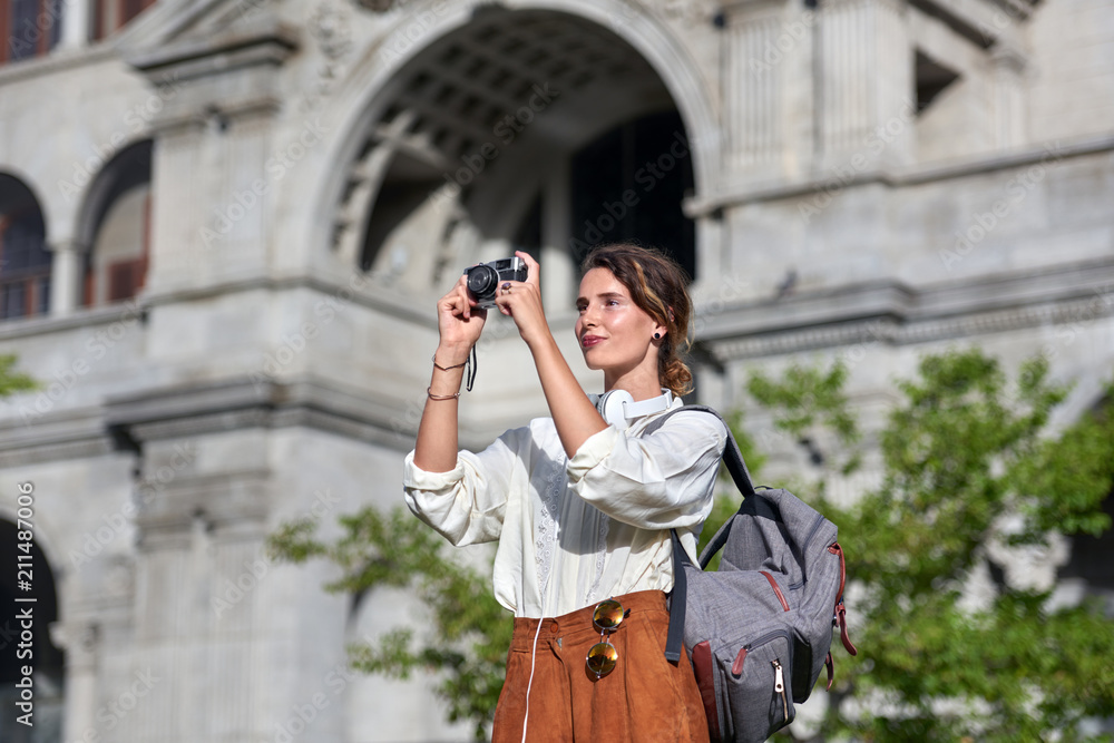 solo travel woman making memories on holiday european architecture