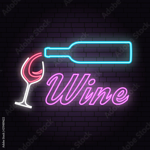 Retro neon wine sign on brick wall background.